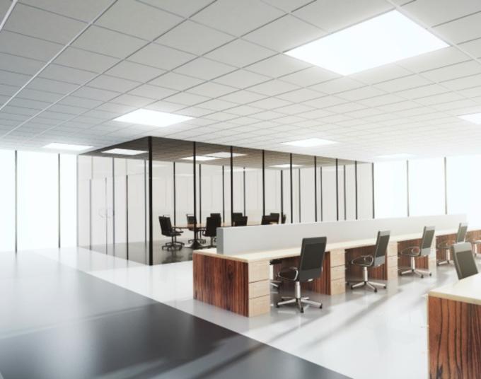 A well-lit office with empty workspaces.