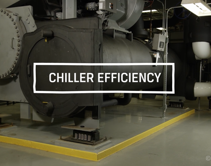 White text is overlaid on an image of a chiller. Text says: Chiller Efficiency